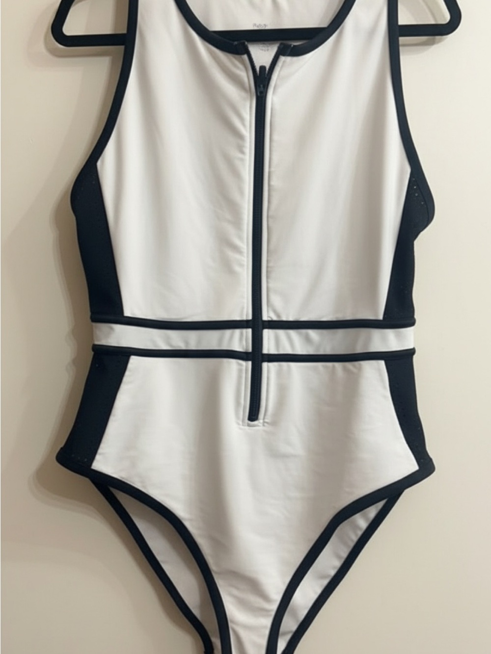 Woman’s White and Black Zip-Front One-Piece Swimsuit